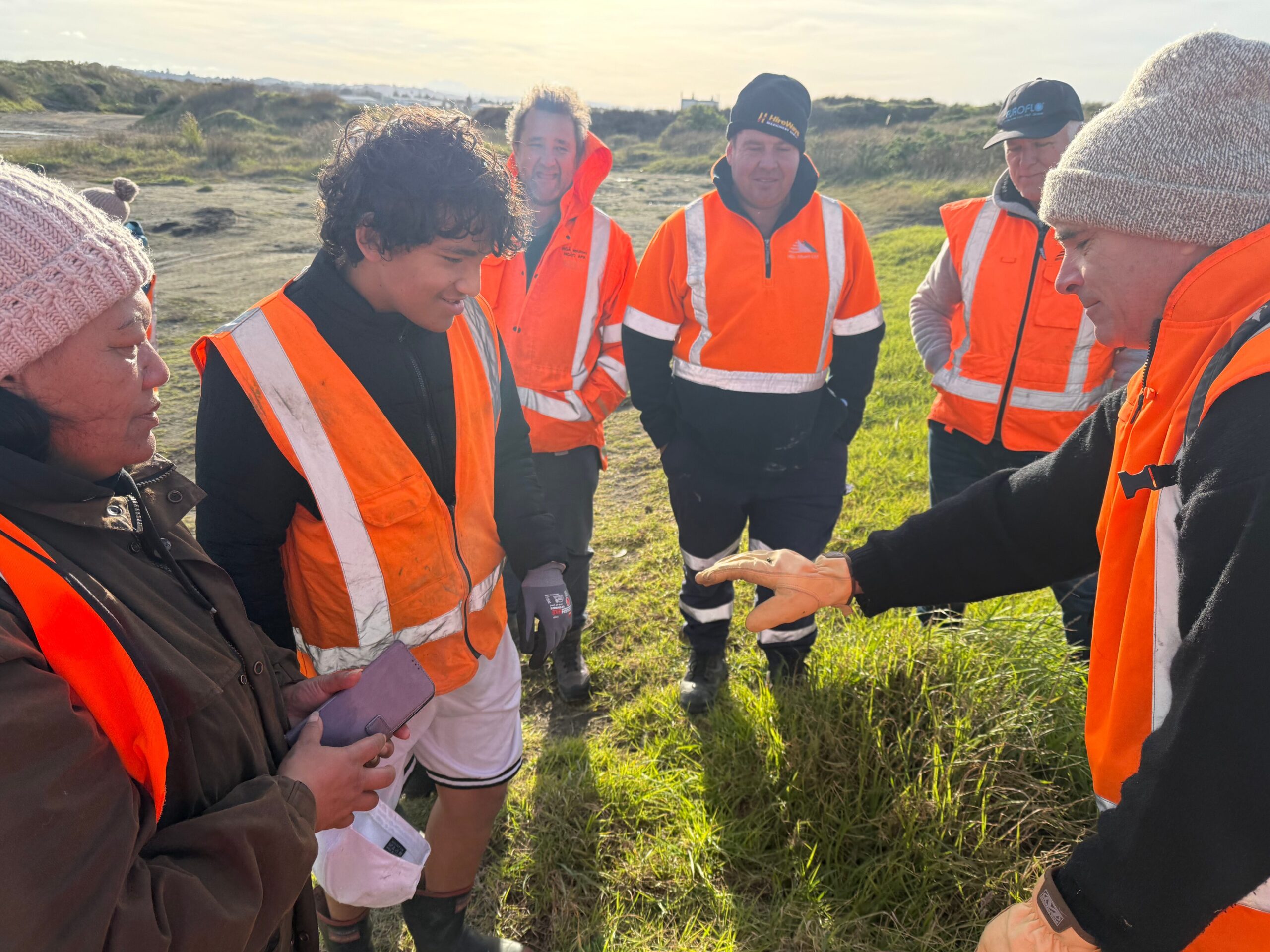 Scientist James Lambie shares his find with representatives from Horizons Regional Council Te Mata Puau and WDETT